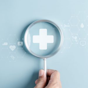 Health insurance concept. people magnifier holding plus and healthcare medical icon, health and access to welfare health concept. Health insurance concept. people magnifier holding plus and healthcare medical icon, health and access to welfare health concept.